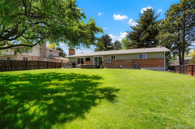 2964 S Akron St, Denver, CO 80231 - back of property featuring cooling unit and brick siding