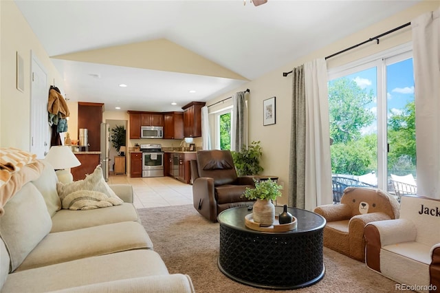2964 S Akron St, Denver, CO 80231 - living room featuring lofted ceiling, recessed lighting, and light tile patterned floors