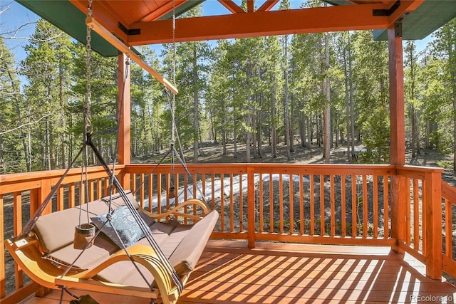 398 Mountain View Dr, Black Hawk, CO 80422 - wooden terrace with view of wooded area