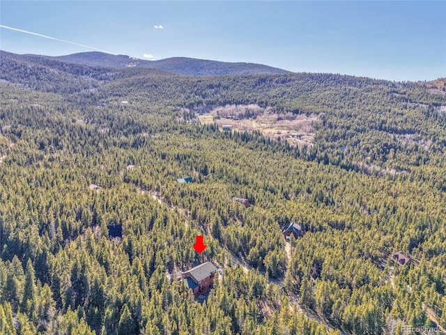 398 Mountain View Dr, Black Hawk, CO 80422 - aerial overview of property's location with a heavily wooded area and mountains