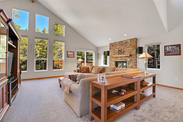 398 Mountain View Dr, Black Hawk, CO 80422 - living area featuring high vaulted ceiling, light carpet, a stone fireplace, and baseboards