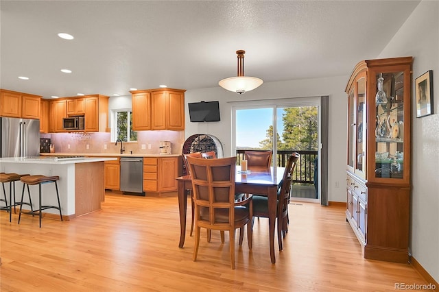 398 Mountain View Dr, Black Hawk, CO 80422 - dining space with healthy amount of natural light, light wood-type flooring, and recessed lighting