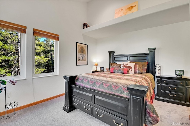 398 Mountain View Dr, Black Hawk, CO 80422 - carpeted bedroom featuring baseboards and a towering ceiling