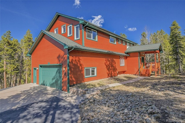 398 Mountain View Dr, Black Hawk, CO 80422 - view of side of property with driveway and a garage