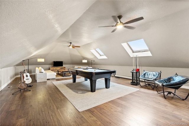 18 Club Ln, Littleton, CO 80123 - playroom featuring a ceiling fan, lofted ceiling with skylight, billiards, and a textured ceiling