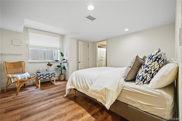 18 Club Ln, Littleton, CO 80123 - bedroom featuring light wood-type flooring, recessed lighting, baseboards, and visible vents