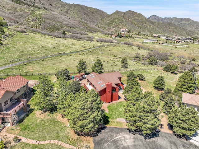drone / aerial view featuring a rural view and a mountain view