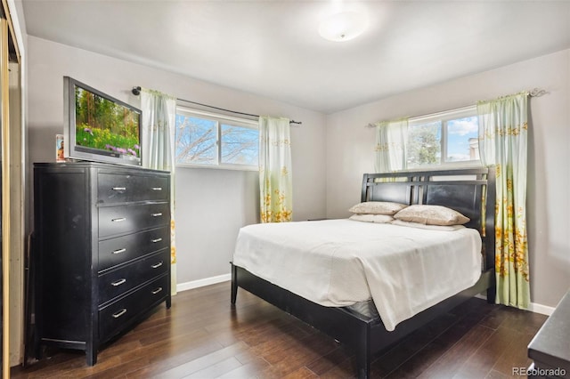 bedroom featuring dark wood-type flooring