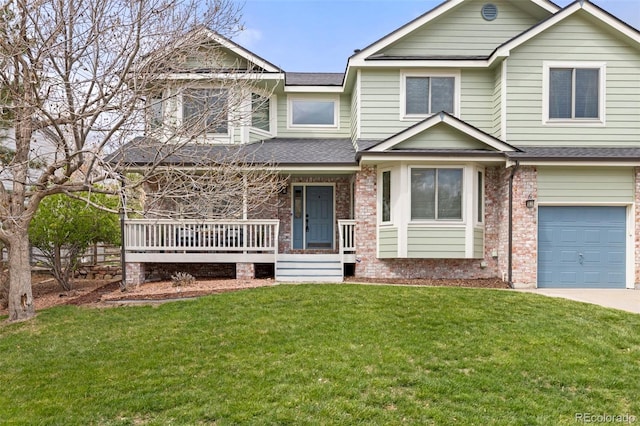 view of front of property with a shingled roof, brick siding, a garage, a front yard, and covered porch