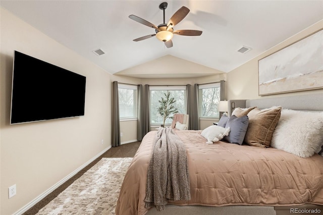 bedroom with baseboards, visible vents, lofted ceiling, and carpet