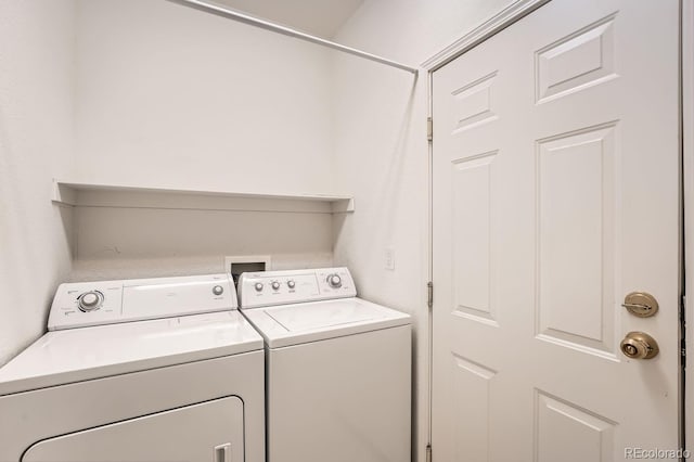 laundry area featuring washer and clothes dryer