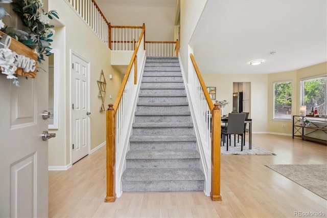 15597 E Dorado Ave, Centennial, CO 80015 - stairway with wood finished floors and baseboards