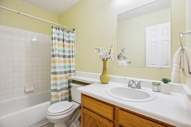 15597 E Dorado Ave, Centennial, CO 80015 - full bathroom with vanity, toilet, and shower / tub combo with curtain