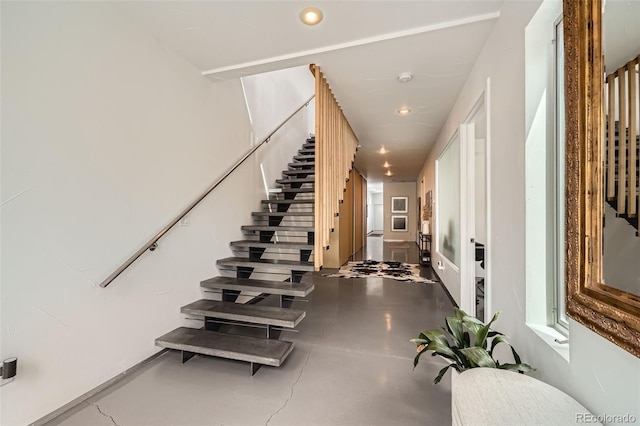 3850 Vallejo St, Denver, CO 80211 - stairway with recessed lighting and finished concrete flooring
