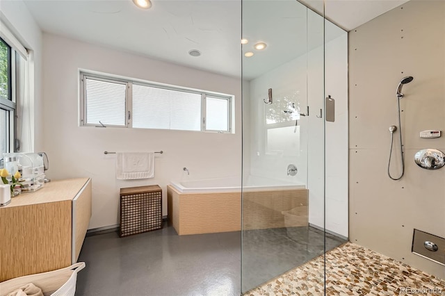 3850 Vallejo St, Denver, CO 80211 - full bathroom featuring a walk in shower, a garden tub, and recessed lighting
