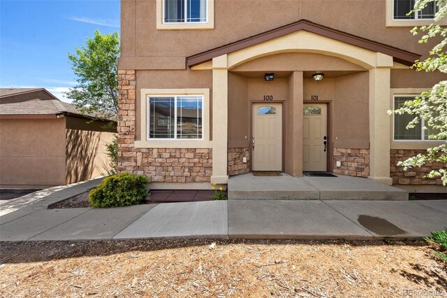 1510 York Rd Unit 100, Colorado Springs, CO 80918 - property entrance with stone siding and stucco siding