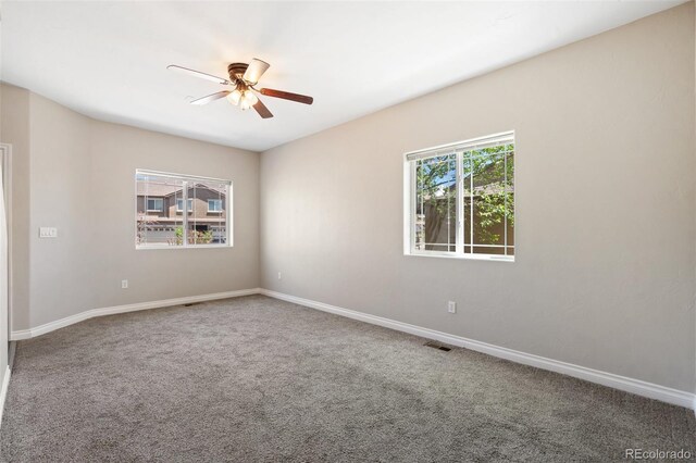 1510 York Rd Unit 100, Colorado Springs, CO 80918 - empty room with a ceiling fan, carpet floors, and baseboards