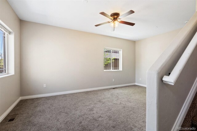 1510 York Rd Unit 100, Colorado Springs, CO 80918 - empty room featuring carpet, a ceiling fan, and baseboards