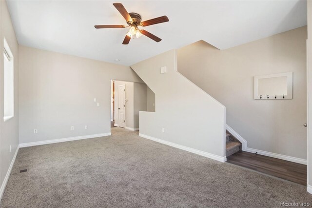 1510 York Rd Unit 100, Colorado Springs, CO 80918 - unfurnished living room featuring a ceiling fan, carpet flooring, stairway, and baseboards