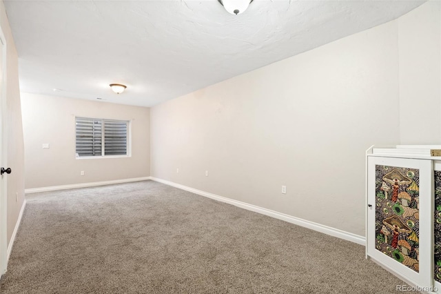 1510 York Rd Unit 100, Colorado Springs, CO 80918 - carpeted spare room with baseboards