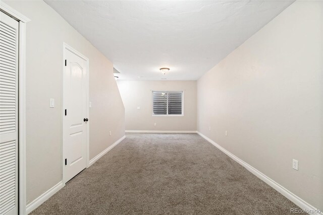 1510 York Rd Unit 100, Colorado Springs, CO 80918 - spare room featuring carpet flooring and baseboards