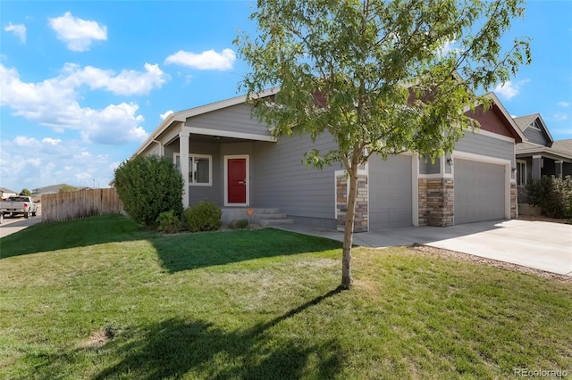 view of front facade featuring a front lawn and a garage