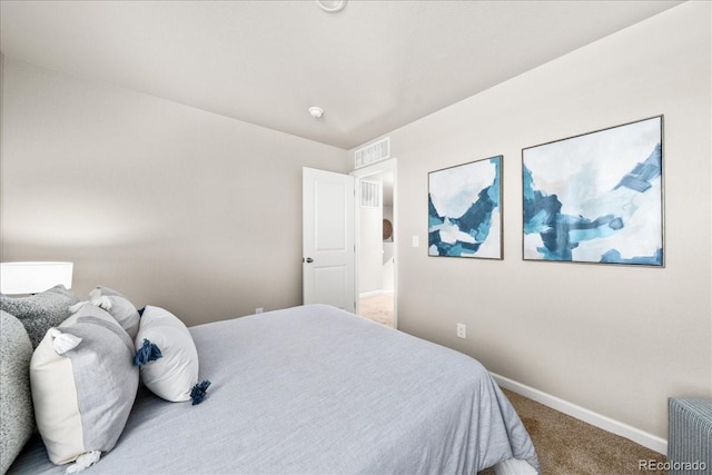 bedroom with radiator, carpet, visible vents, and baseboards