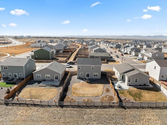 birds eye view of property with a residential view