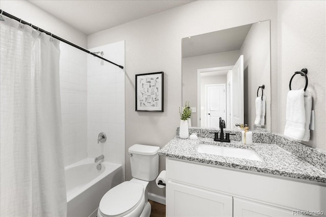 full bath featuring shower / tub combo with curtain, vanity, and toilet