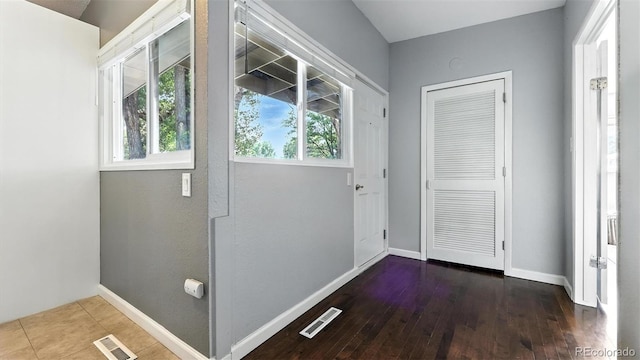 2829 Illinois Ave, Colorado Springs, CO 80907 - entryway featuring dark wood-style flooring and baseboards