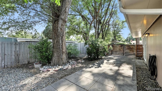 2829 Illinois Ave, Colorado Springs, CO 80907 - fenced backyard featuring a patio