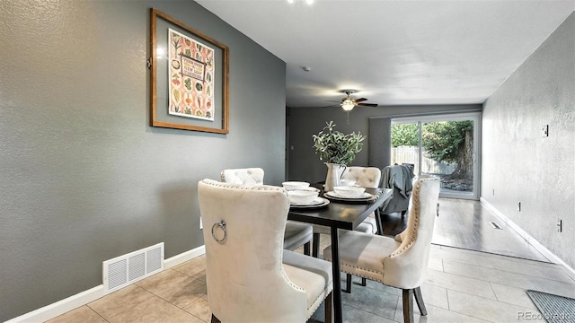 2829 Illinois Ave, Colorado Springs, CO 80907 - dining area featuring a textured wall, tile patterned flooring, and a ceiling fan
