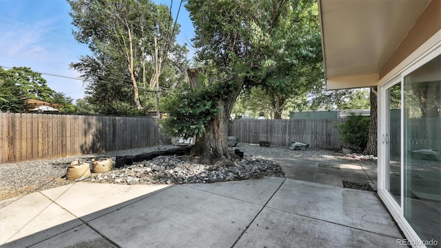 2829 Illinois Ave, Colorado Springs, CO 80907 - fenced backyard featuring a patio area