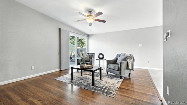 2829 Illinois Ave, Colorado Springs, CO 80907 - living area featuring ceiling fan, vaulted ceiling, wood finished floors, and a textured wall