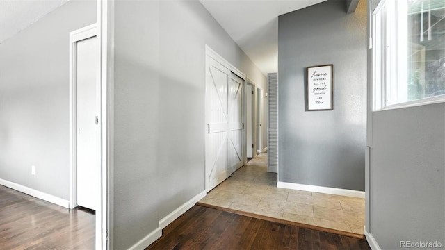 2829 Illinois Ave, Colorado Springs, CO 80907 - hallway with hardwood / wood-style flooring and baseboards