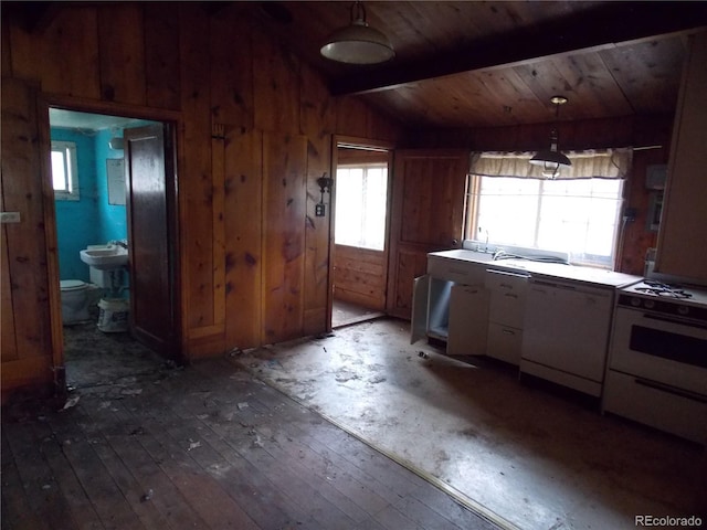 222 S Fairview St, Woodland Park, CO 80863 - kitchen featuring white appliances, white cabinets, wooden walls, wooden ceiling, and pendant lighting