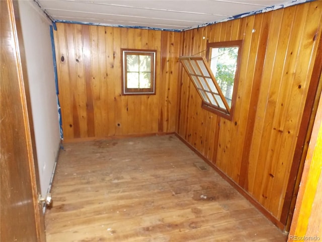 222 S Fairview St, Woodland Park, CO 80863 - unfurnished room with hardwood / wood-style flooring and wood walls