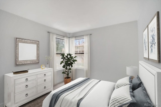 7870 W 87th Dr Unit J, Arvada, CO 80005 - bedroom featuring dark carpet