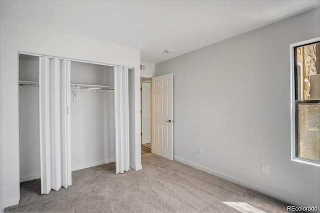 7870 W 87th Dr Unit J, Arvada, CO 80005 - unfurnished bedroom featuring carpet and baseboards