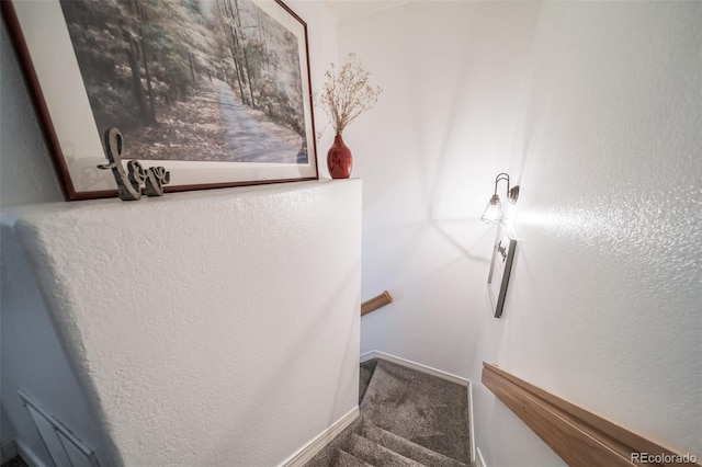 staircase with carpet and baseboards