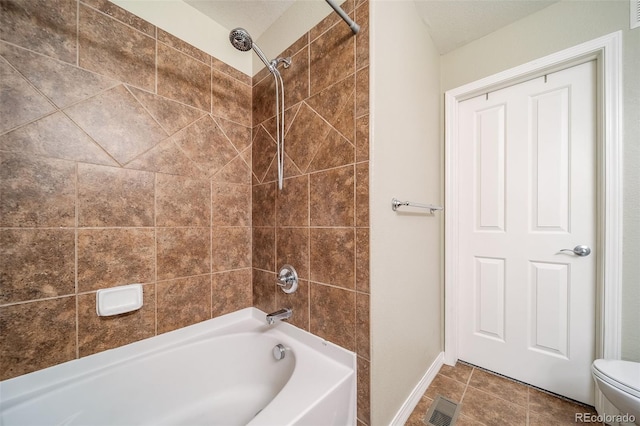 full bathroom with visible vents, toilet,  shower combination, and tile patterned flooring