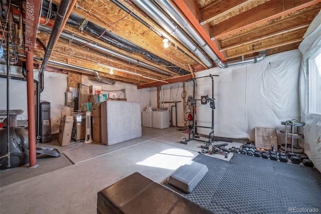 unfinished basement featuring washer and dryer