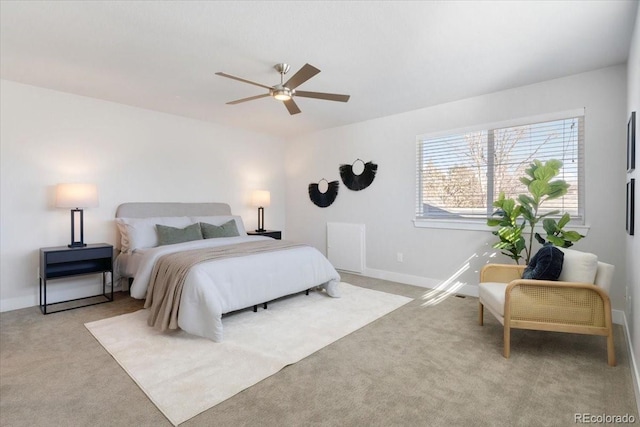 bedroom featuring carpet flooring, ceiling fan, and baseboards