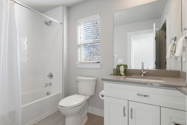 full bathroom featuring baseboards, shower / tub combo, toilet, and vanity