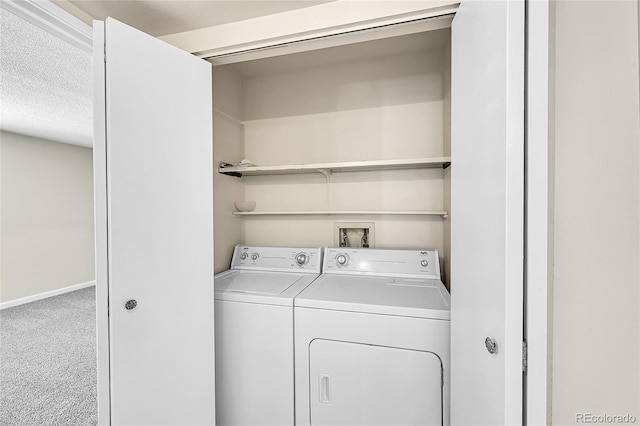 laundry area featuring laundry area, washing machine and dryer, baseboards, and carpet floors