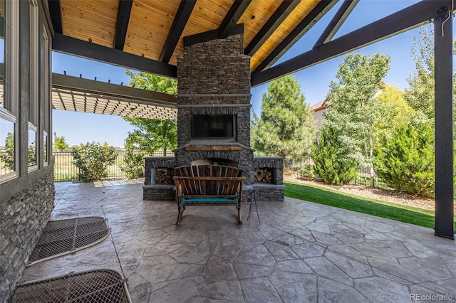 view of patio / terrace with an outdoor stone fireplace