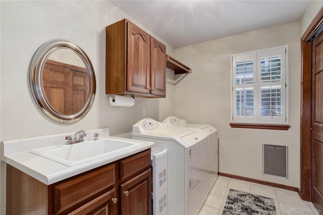 10032 Astoria Ct, Lone Tree, CO 80124 - laundry room featuring cabinet space, separate washer and dryer, and light tile patterned floors