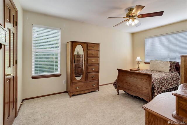 10032 Astoria Ct, Lone Tree, CO 80124 - bedroom featuring light carpet and a ceiling fan