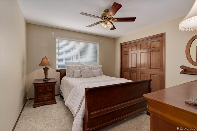 10032 Astoria Ct, Lone Tree, CO 80124 - bedroom with light colored carpet, a closet, and a ceiling fan