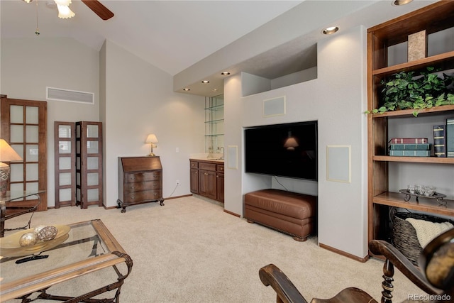 10032 Astoria Ct, Lone Tree, CO 80124 - living area with light colored carpet, a ceiling fan, and vaulted ceiling